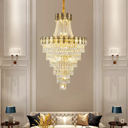 A multi-tiered modern gold spiral decorbites crystal chandelier pendant light hangs elegantly from the ceiling