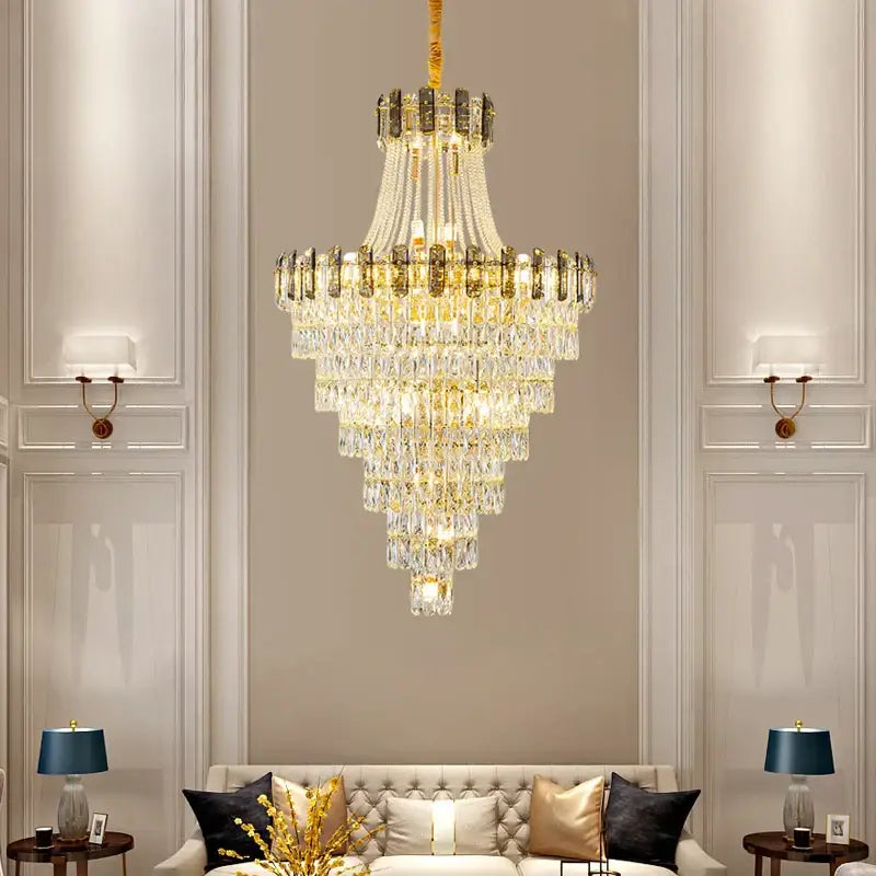 A multi-tiered modern gold spiral decorbites crystal chandelier pendant light hangs elegantly from the ceiling