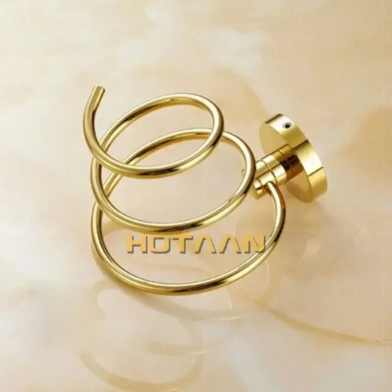 Modern gold spiral hair dryer holder with polished metal finish and anti rust design for bathroom use