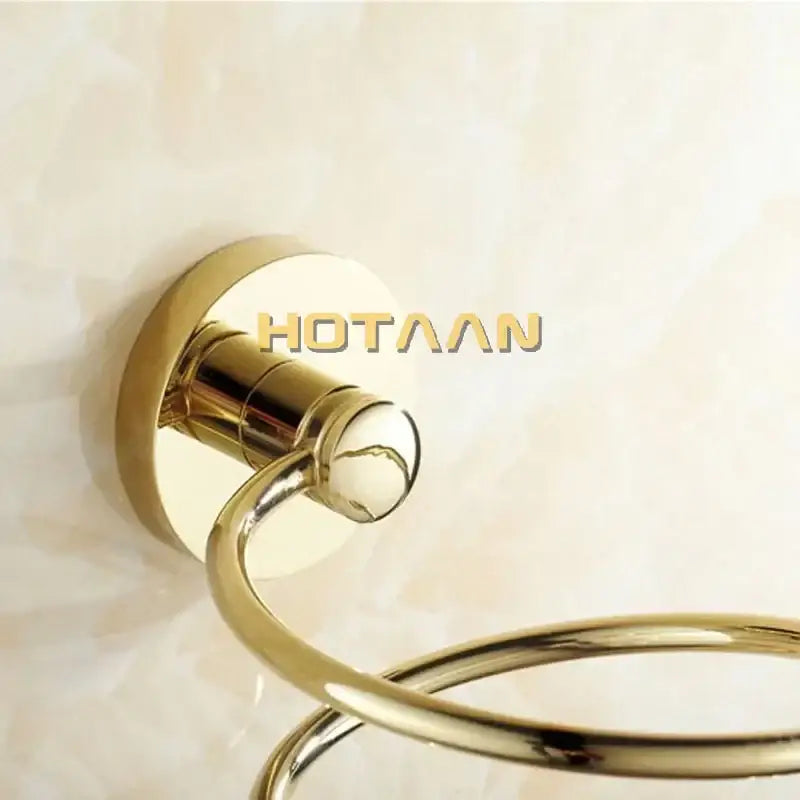 Modern gold spiral hair dryer holder with gold-finished double-ring polished metallic anti-rust dryer holder rack