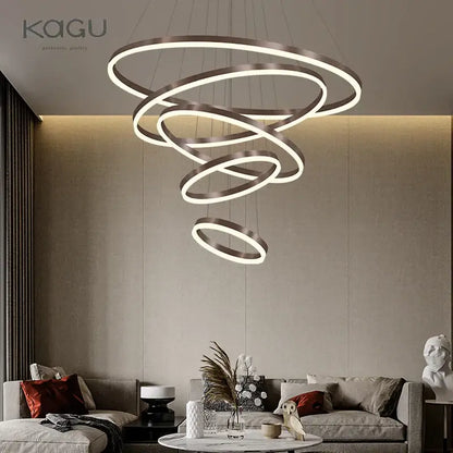 Modern gold spiral pendant light with sleek metallic finish and integrated black led rings for dining room decorbites black led