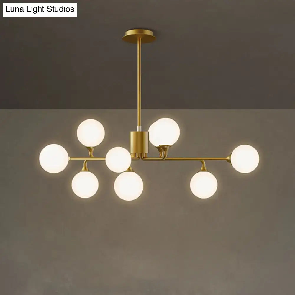 DecorBites gold metal sputnik pendant lighting with white glass shades and eight frosted globes for living room