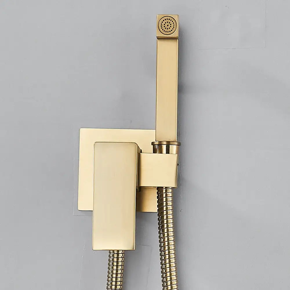 Modern gold square bidet shower faucet with a sleek handheld sprayer and braided hose for wall-mounted bathroom use