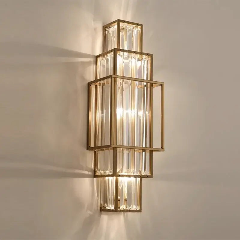 Modern gold stacked crystal wall lamp with rectangular frames and vertical glass crystal rods for luxury bedroom lighting