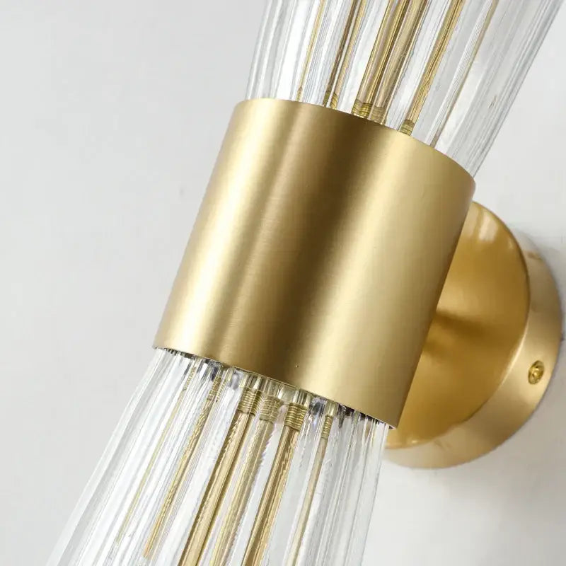 Modern gold stainless steel fluted glass wall sconce with clear ribbed rods and brass base for bedroom decorbites gold stainless