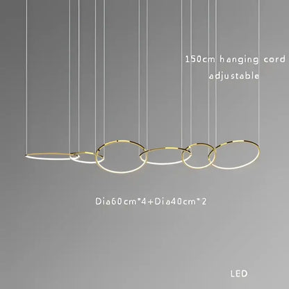 Modern gold stainless steel pendant lamp with interconnected circular rings suspended by adjustable cords decorbites gold stainless