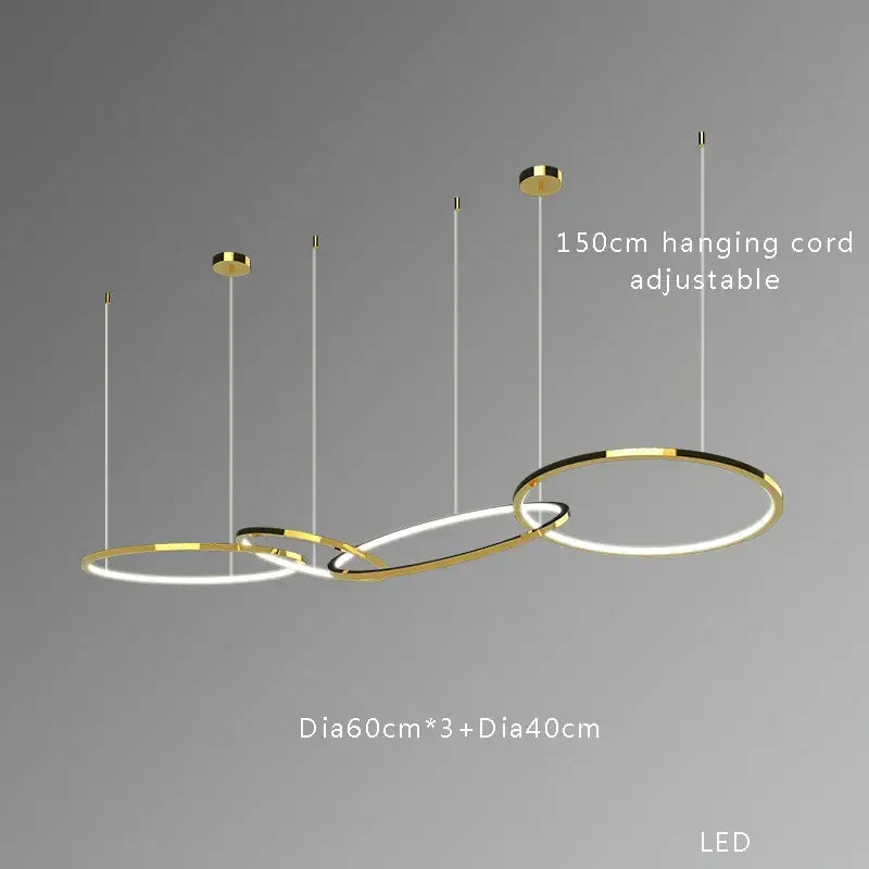 Modern gold stainless steel pendant lamp featuring three interlocking illuminated rings with adjustable cords by decorbites