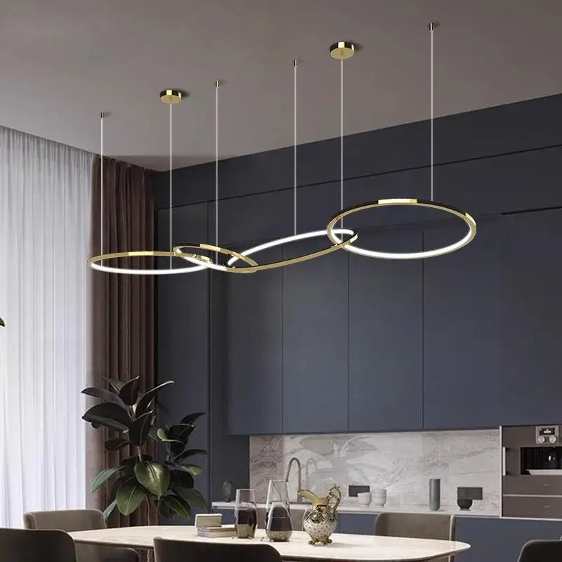 Modern gold stainless steel pendant lamp with sleek white circular rings for kitchen decorbites gold stainless lighting