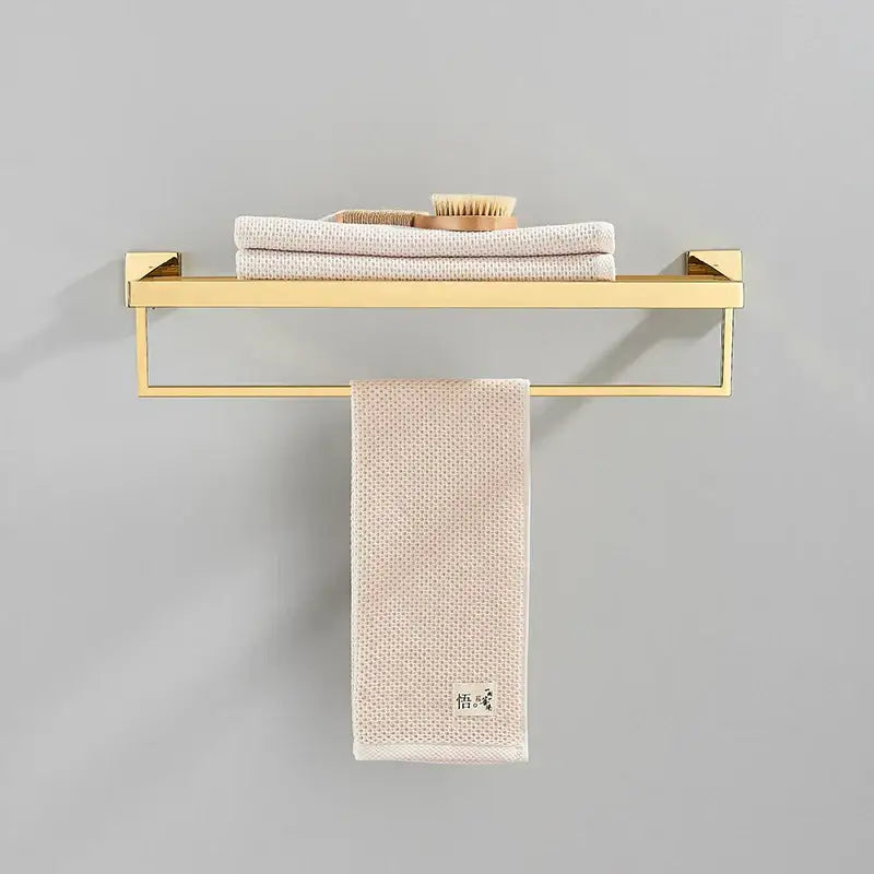 Modern gold stainless steel wall mount towel rack with rectangular design and integrated bathroom shelf