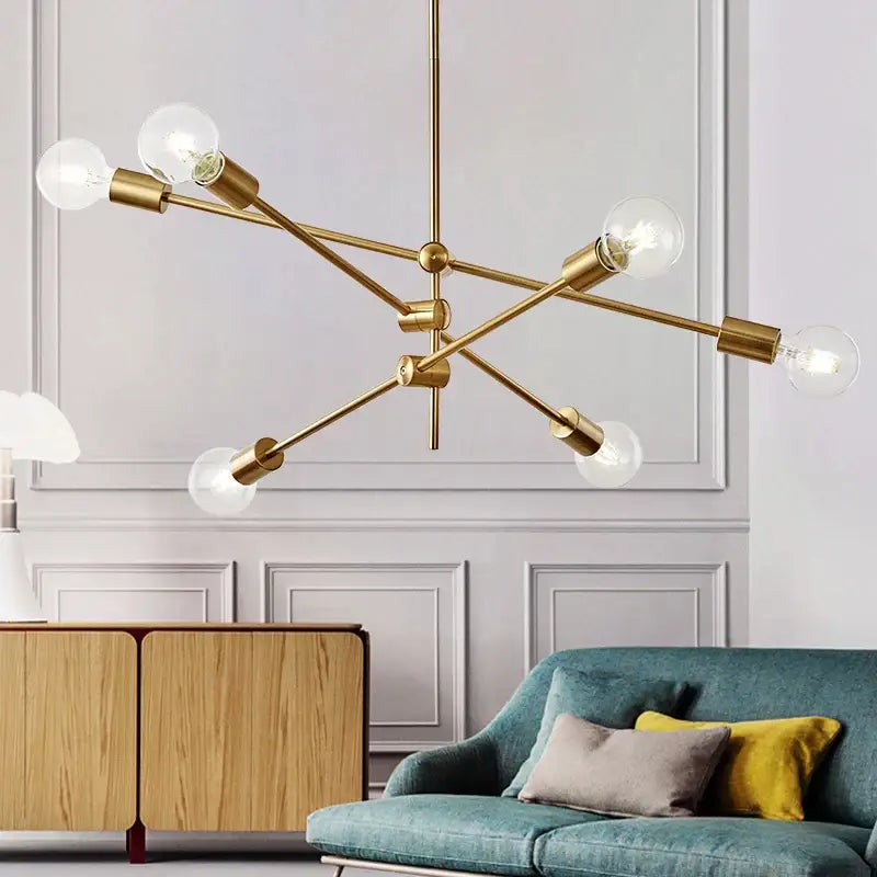 Modern gold starburst glass ball globe pendant light with six exposed bulbs in gold-toned brass for dining room decorbites glass ball