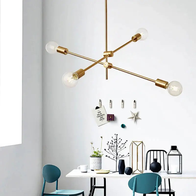 Modern gold starburst glass ball globe pendant light with five exposed bulb fixtures ideal for dining room decorbites pendant light