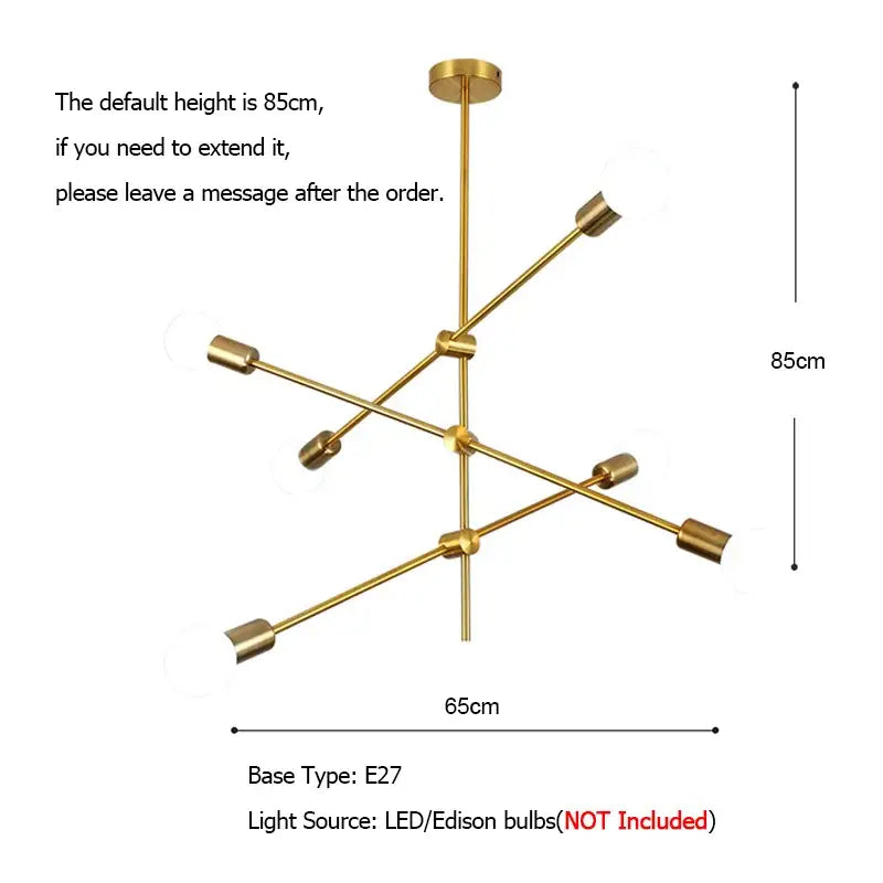 Modern gold starburst pendant light with six gold cylindrical arms and glass ball globe for dining room decorbites
