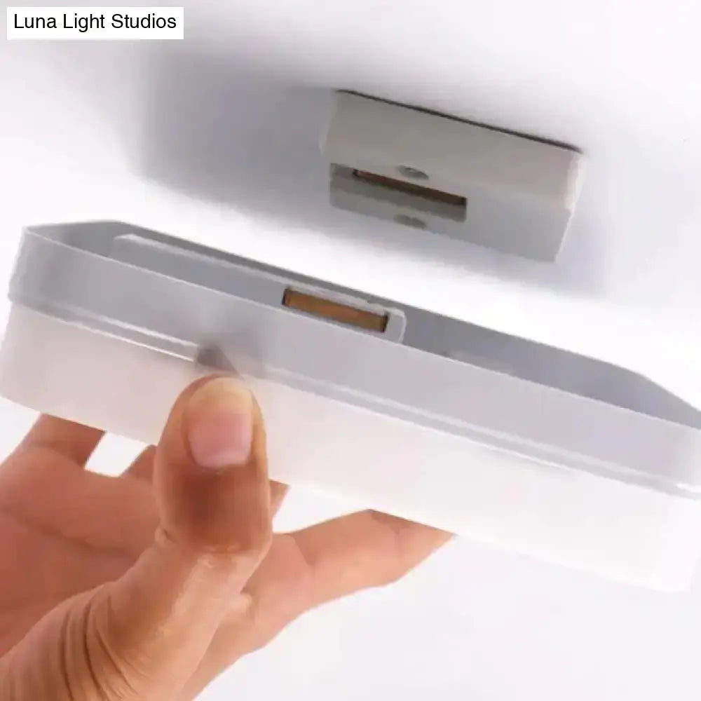 White plastic surface mounted led square panel light with sleek rectangular design available in 18w 24w 36w 48w options