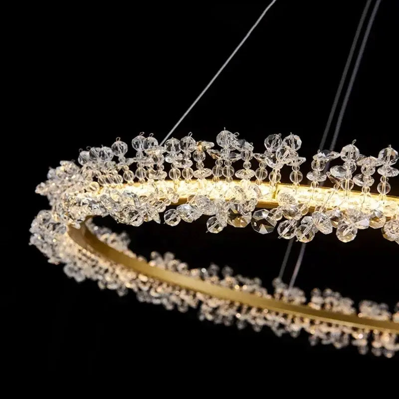 Modern gold swirling crystal pendant chandelier with cascading clear beads for elegant dining room decorbites crystal pendant
