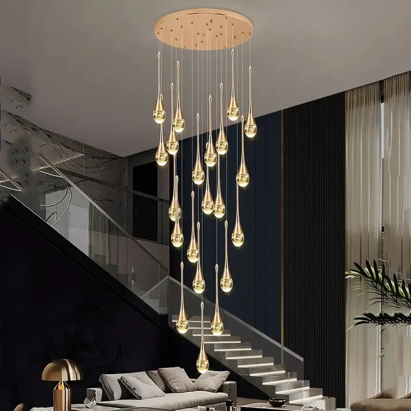 Modern gold teardrop crystal pendant light with circular ceiling mount ideal for dining room pendant lighting
