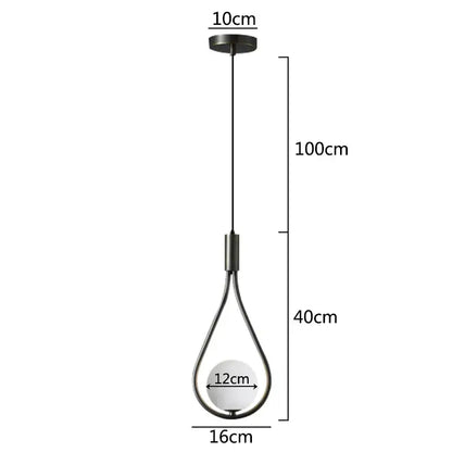Modern black metal pendant light with frosted glass globe complements decorbites glass ball pendant kitchen decor