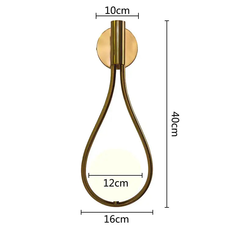 A modern gold brass teardrop glass ball pendant light with illuminated glass panel for kitchen decorbites decor