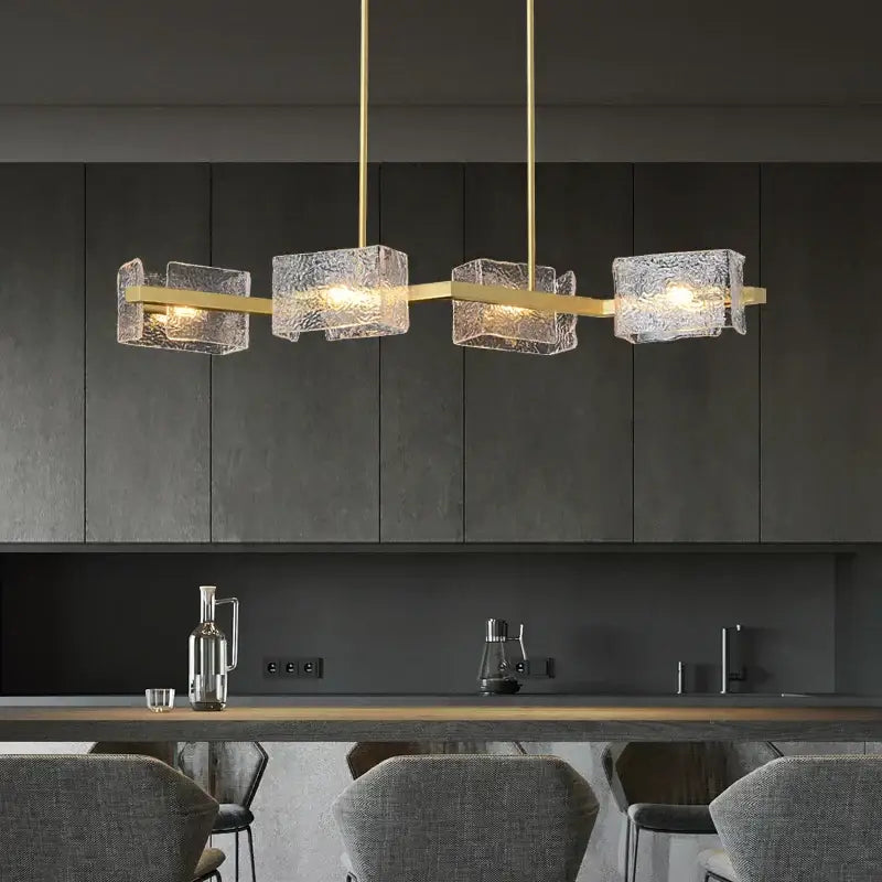Modern gold textured glass crystal chandelier with translucent cube pendants by decorbites crystal chandelier