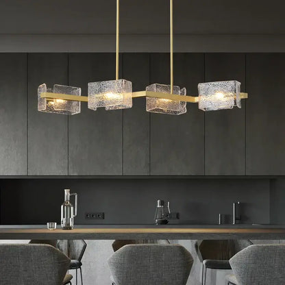 Modern gold textured glass crystal chandelier with translucent cube pendants by decorbites crystal chandelier
