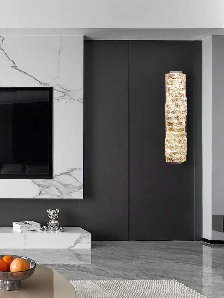 Modern gold textured glass wall sconce lamps featuring amber glass segments for warm bedroom decor lighting