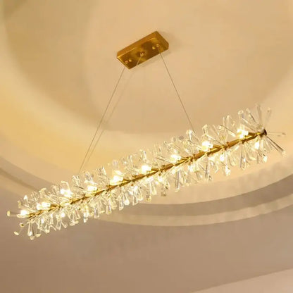 A modern gold three tier decorbites crystal led chandelier with clear crystal prisms for dining room light decorbites crystal led