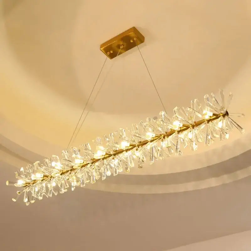 A modern gold three tier decorbites crystal led chandelier with clear crystal prisms for dining room light decorbites crystal led