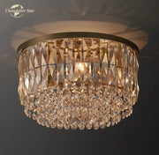 Modern gold tiered crystal flushmount ceiling light with cascading faceted glass prisms for dining room decorbites crystal flushmount