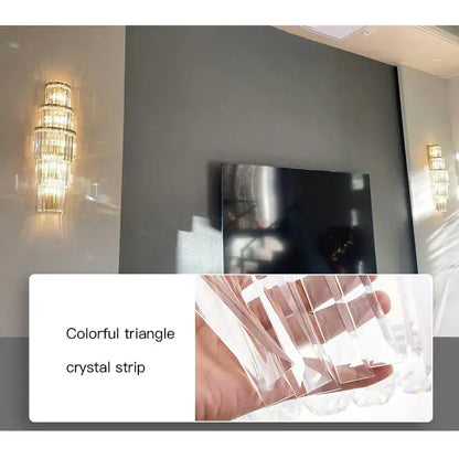 Modern gold tiered crystal nordic wall lamp featuring a colorful triangle crystal strip with clear faceted edges