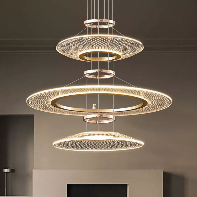 Modern gold tiered mesh pendant chandelier with three concentric rings featuring warm led lighting for living room use