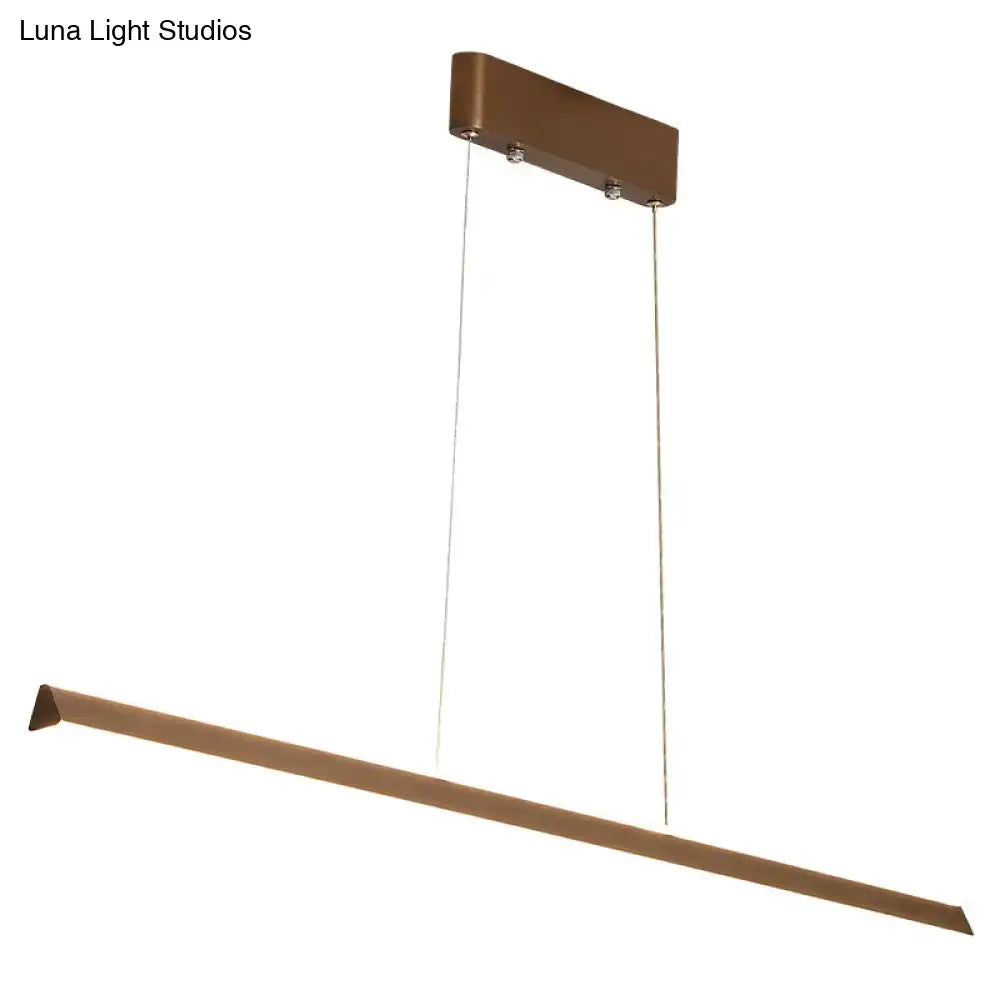 Modern bronze-finished aluminum triangular prism pendant lamp with sleek design and thin cables for dining room lighting