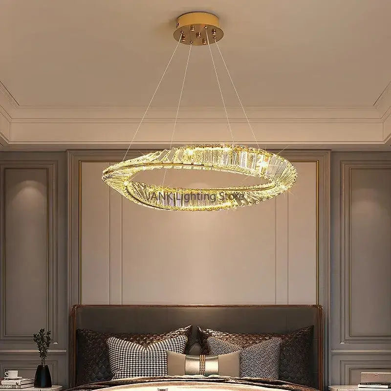 Modern gold triple ring decorbites crystal ceiling chandelier with gold-toned crystal design and hanging wires for living room