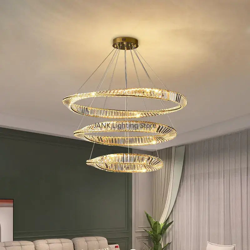 Modern gold triple ring decorbites crystal ceiling chandelier with crystal-encrusted rings and brushed brass mount