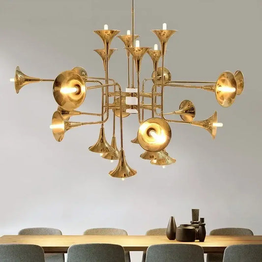 Modern gold trumpet pendant chandeliers with multiple trumpet-shaped arms and glowing bulbs for dining room decorbites gold trumpet