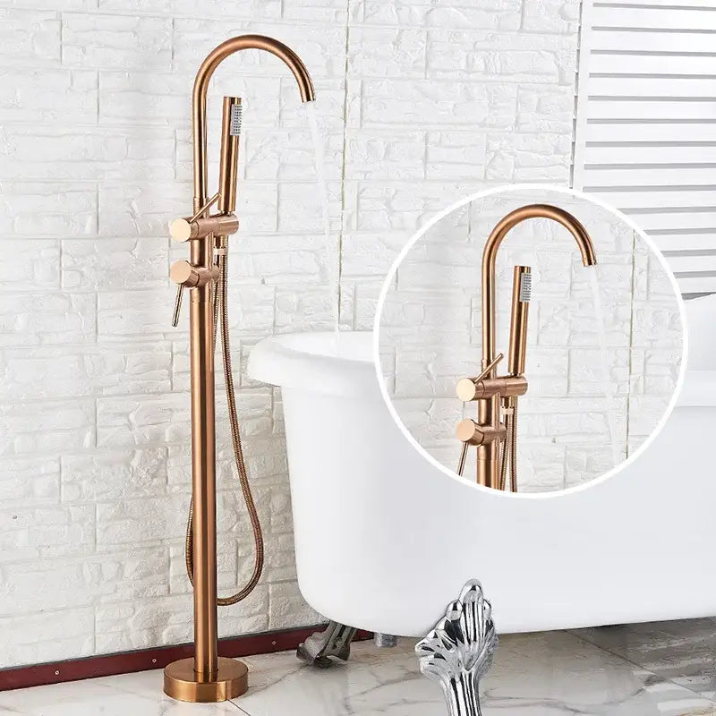Rose gold finish freestanding tub sink faucet with sleek curved spout and brushed brass handles for decorbites gold tub