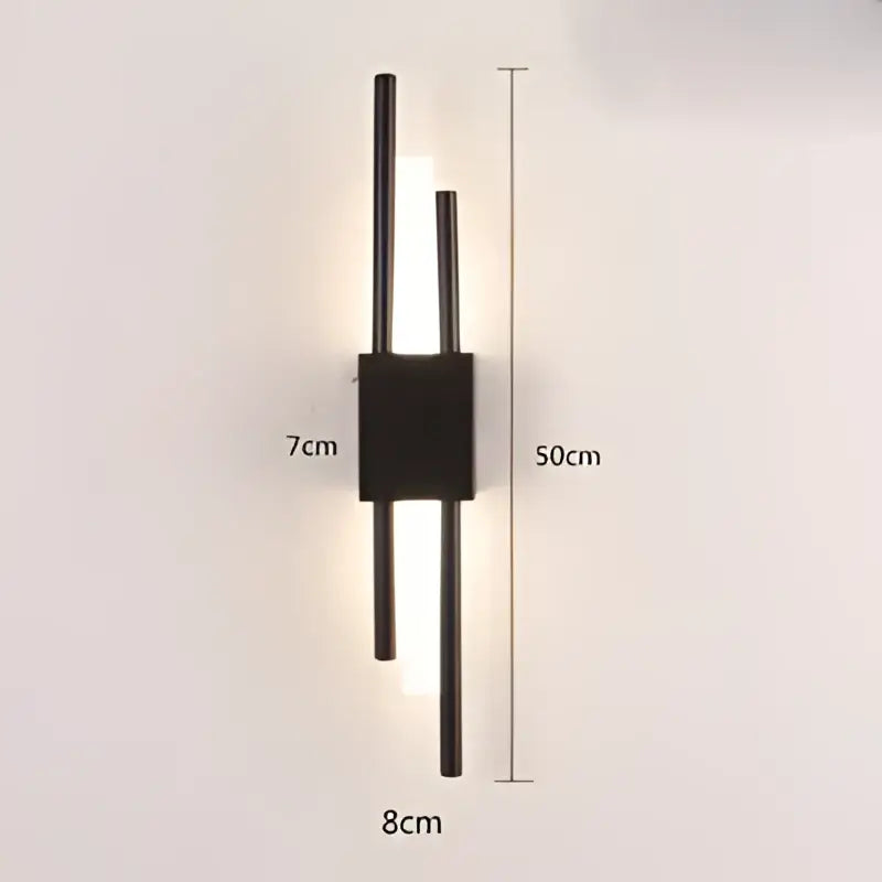 Modern black metal wall sconce with two vertical rods and central base for decorbites gold tube wall bedroom lighting