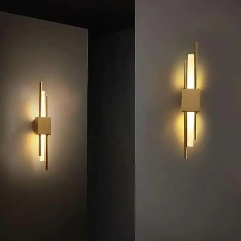 Modern gold tube wall sconce with sleek vertical bars and fabric diffuser for bedroom decorbites gold tube lighting