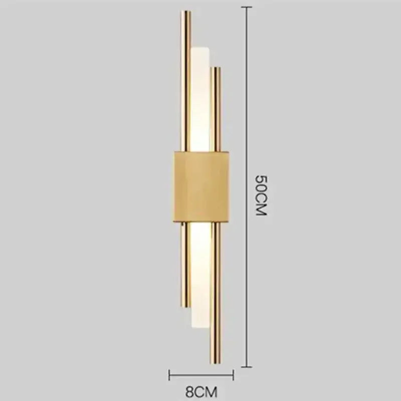 Modern gold tube wall sconce with a sleek minimalist design featuring three vertical rods and frosted glass panels for decorbites gold tube