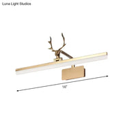 Modern gold tubular antler led vanity light fixture featuring a gold-toned deer-head mounted light fixture with rectangular design