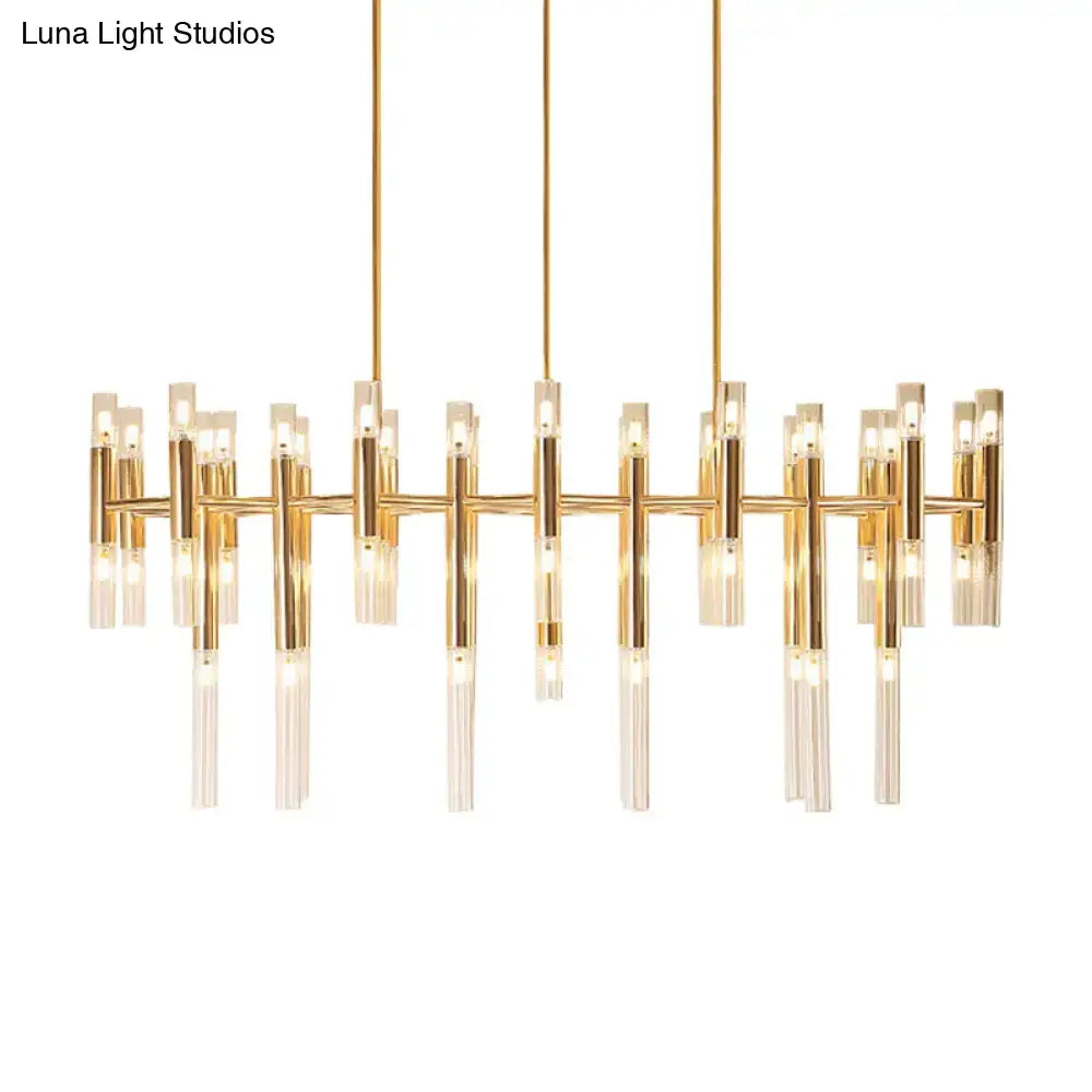 Modern gold-toned decorbites tubular led island pendant with clear glass rods and 54 vertical lights for dining room