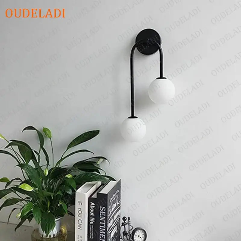 Black metal wall lamp with two white glass ball led shades modern decorbites glass ball living room sconce