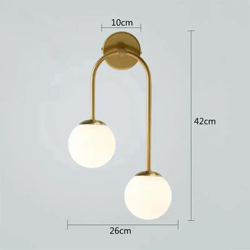 Modern gold wall lamp with two frosted glass ball led shades for elegant living room decorbites glass ball lighting