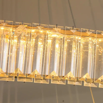 Modern gold two ring decorbites crystal led chandelier with clear crystal prisms and gold triangular accents for dining room decor