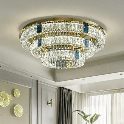 Modern gold two tier crystal led ceiling lamp with blue inlay details and gold-toned metal accents for living room