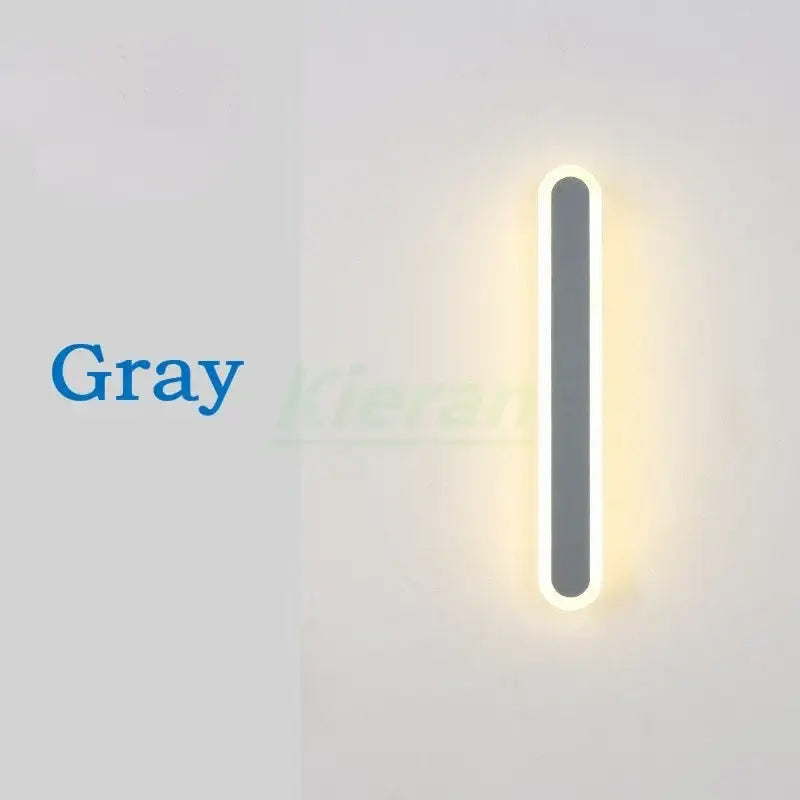 Gray minimalist modern gold vertical decorbites led strip wall light with elongated rectangular design and glowing led strip edges