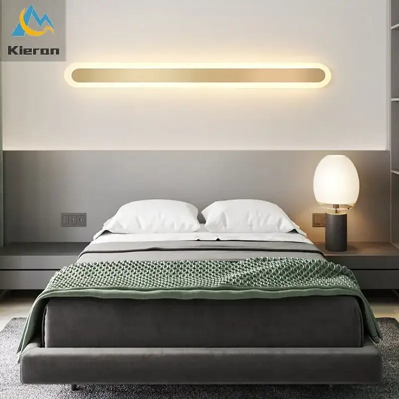 Modern gold vertical led strip wall lights with sleek elongated oval design and warm ambient lighting for bedroom decorbites wall lights
