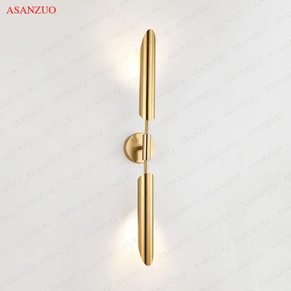 Modern gold vertical led wall lamps with sleek cylindrical arms and circular mounting plate for living room wall lamps lights