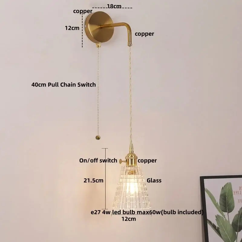 Modern gold wall lamp with clear glass shade brass finish and copper hardware ideal for bedroom decorbites clear glass
