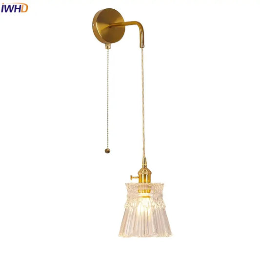 Modern gold wall lamp with clear glass shade and pull chain switch ideal for bedroom lighting decorbites clear glass