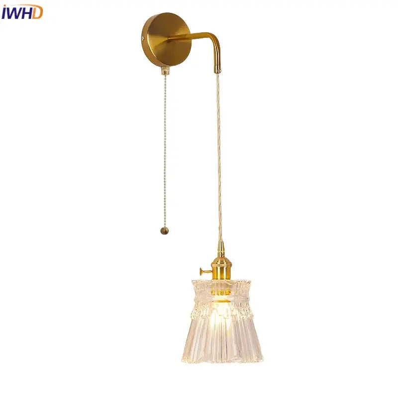 Modern gold wall lamp with clear glass shade and pull chain switch ideal for bedroom lighting decorbites clear glass