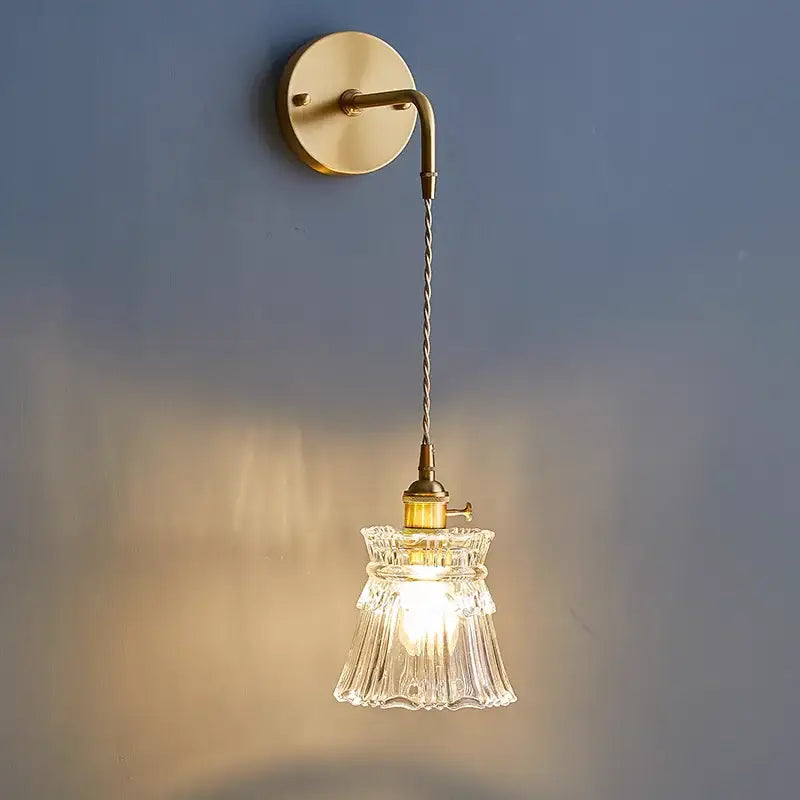 Antique brass wall lamp with clear glass fluted shade and twisted cord ideal for bedroom decorbites clear glass